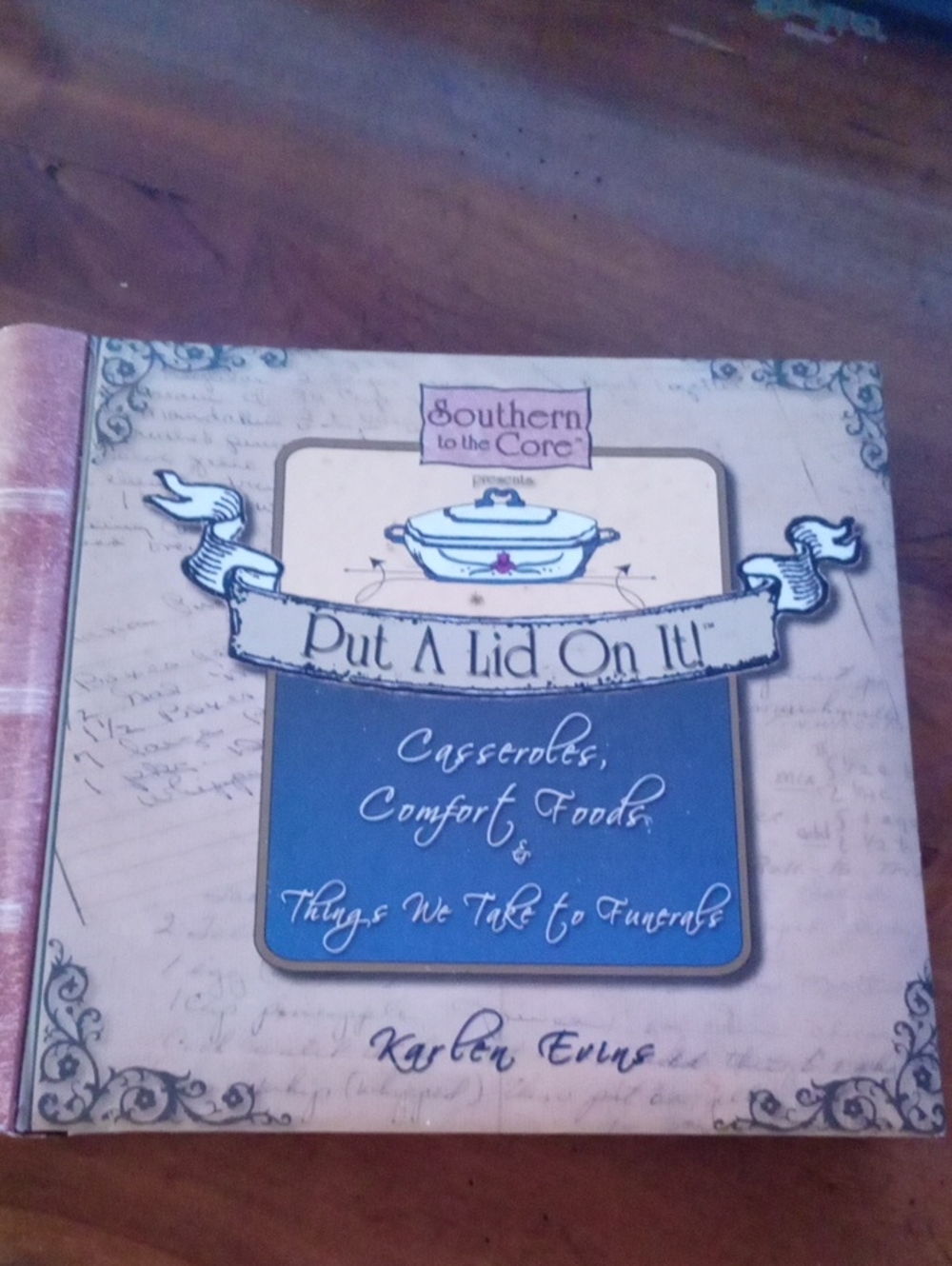 "Put A Lid On It" Cookbook – Cream & Blue Cover